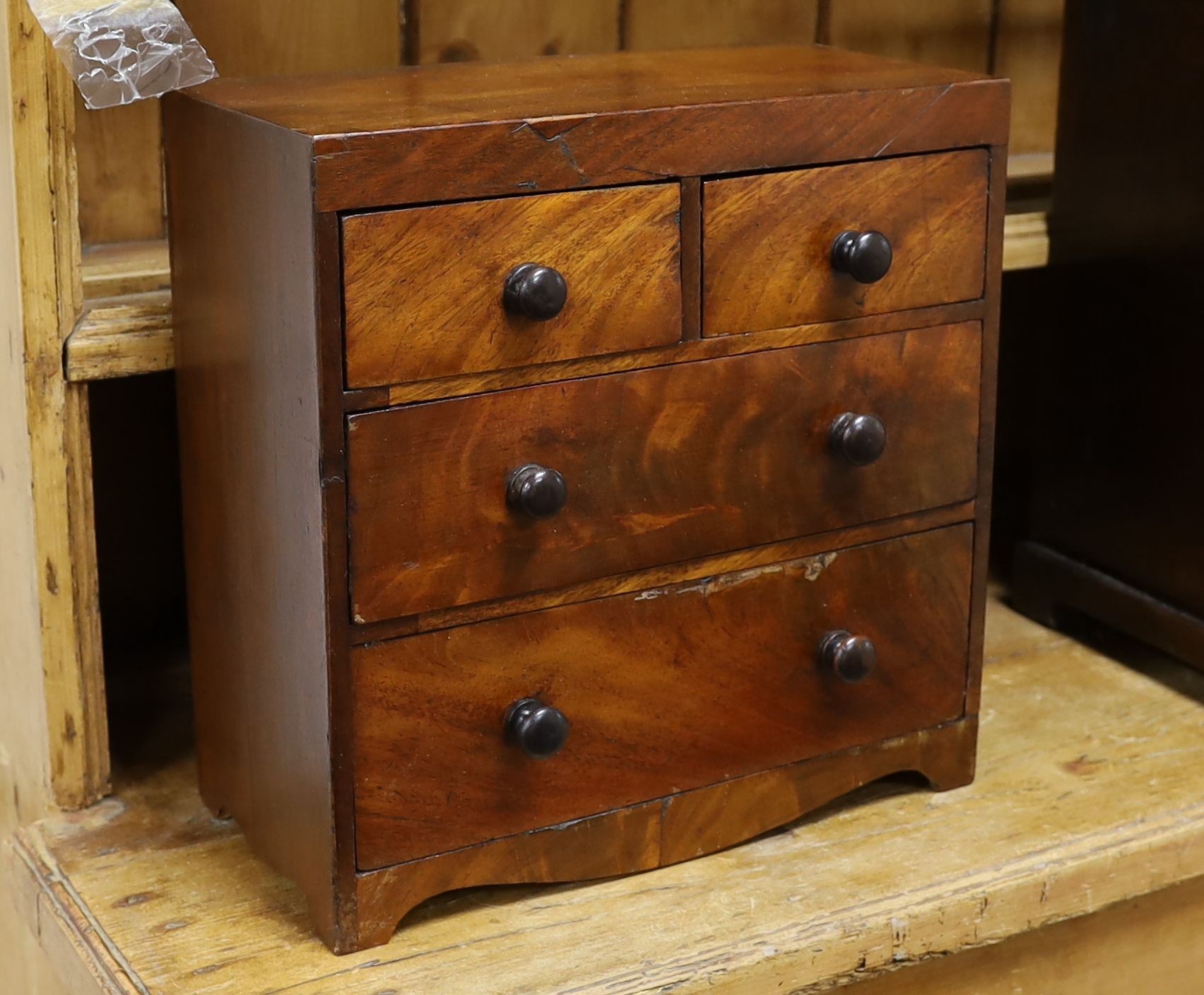 A Victorian mahogany miniature chest, width 32cm, depth 16cm, height 32cm